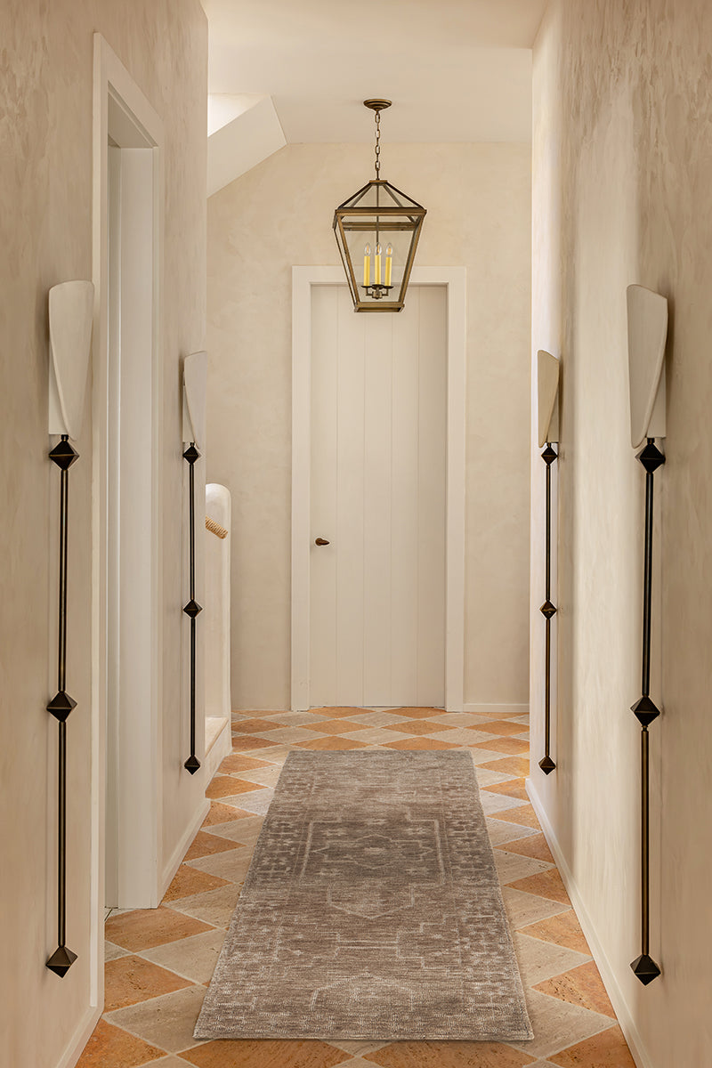 Darren Palmer Ceylon Runner Rug in Almond styled in a hallway